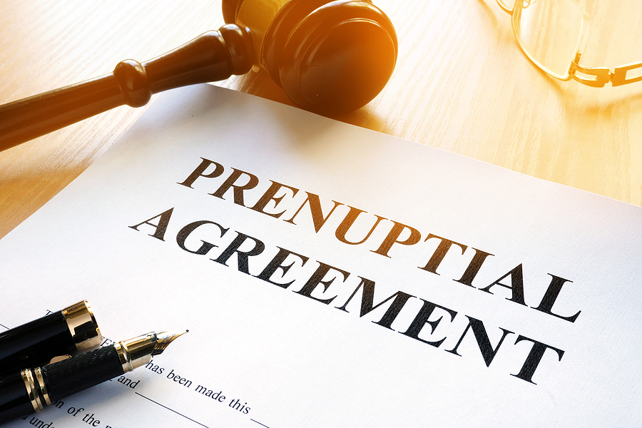Prenuptial agreement and gavel in a court.