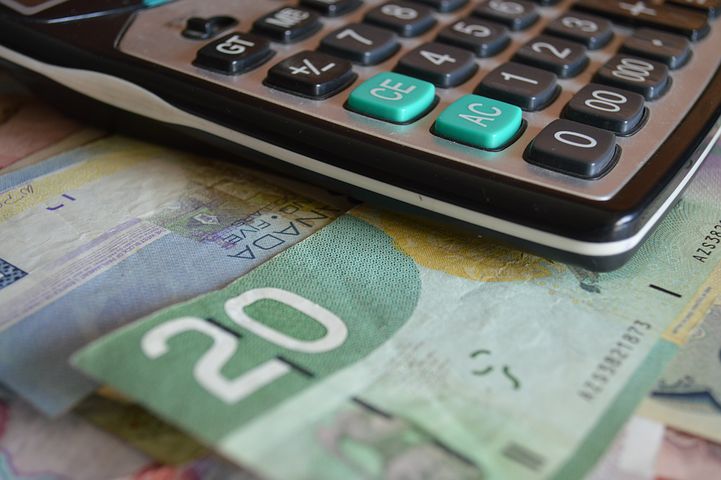 calculator and money bill